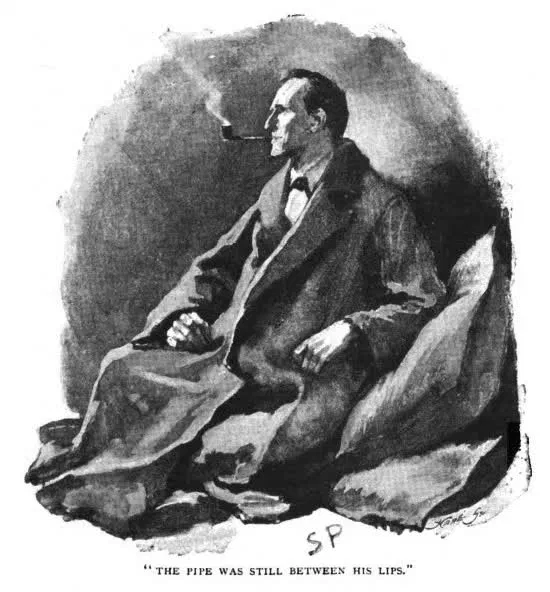The pipe was still between his lips.
